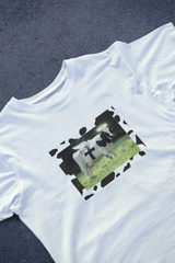 DIYANYONE Surreal Meme T-Shirt: Holy Cow Angel with Black Cross | Divine Bovine Religious Satire & Cow Print Aesthetic Tee