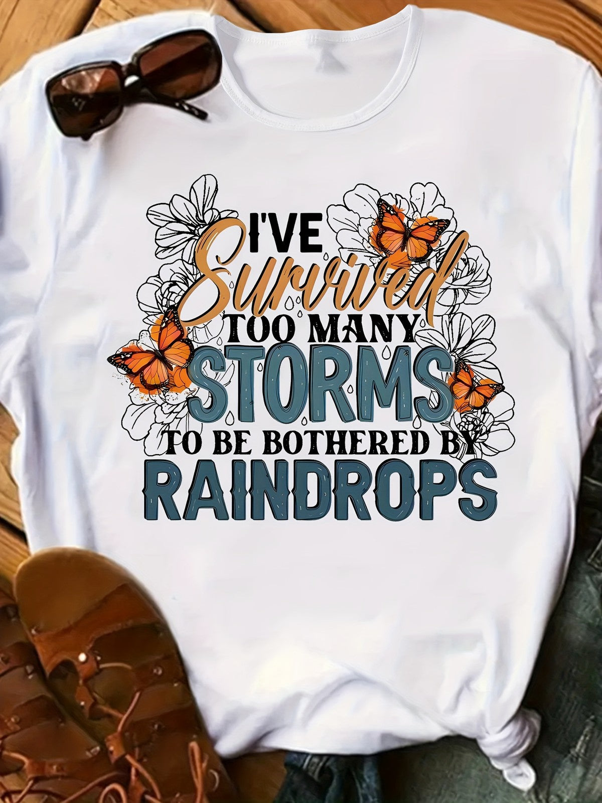 Ive Survived Too Many Storms To Be Bothered By Raindrops Motivational Quote Tee