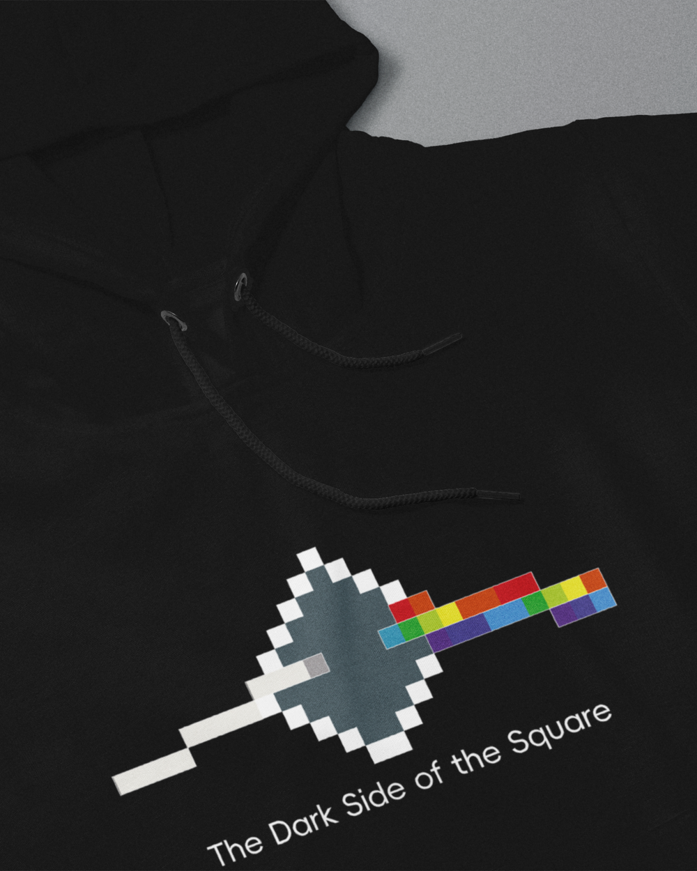 Black hoodie with a pixelated design and text on a gray background