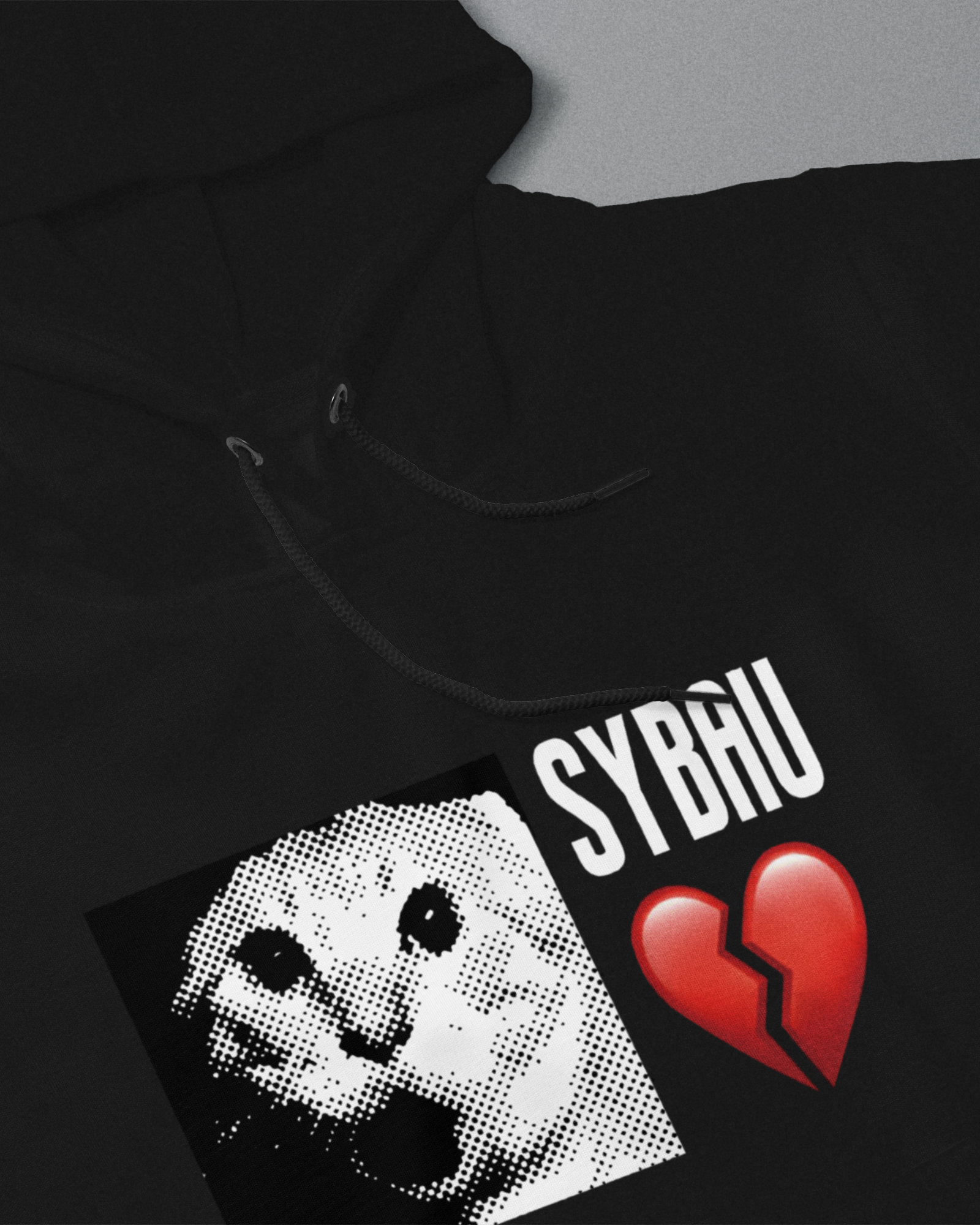 Black hoodie with graphic design and text on a gray background