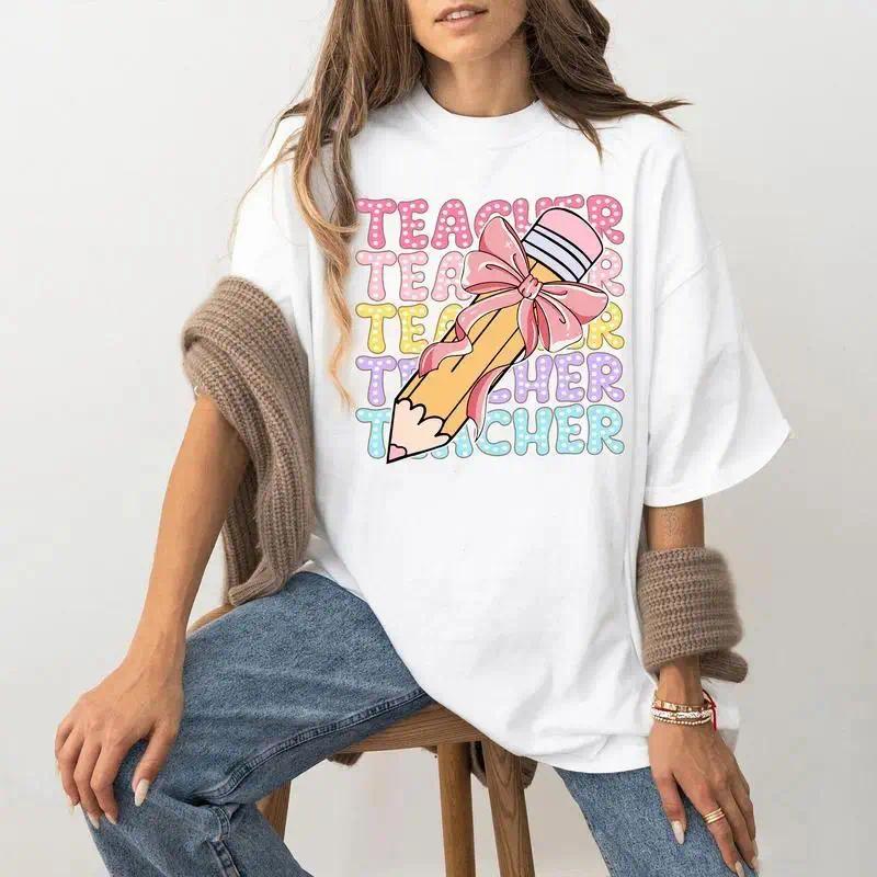 Teacher Shirt, Comfort Color Teacher Tshirt, Pencil Coquette Bow Shirt, Dalmatian Dots Teacher Tee, Bright Doodle School, Pink Bow Streetwear