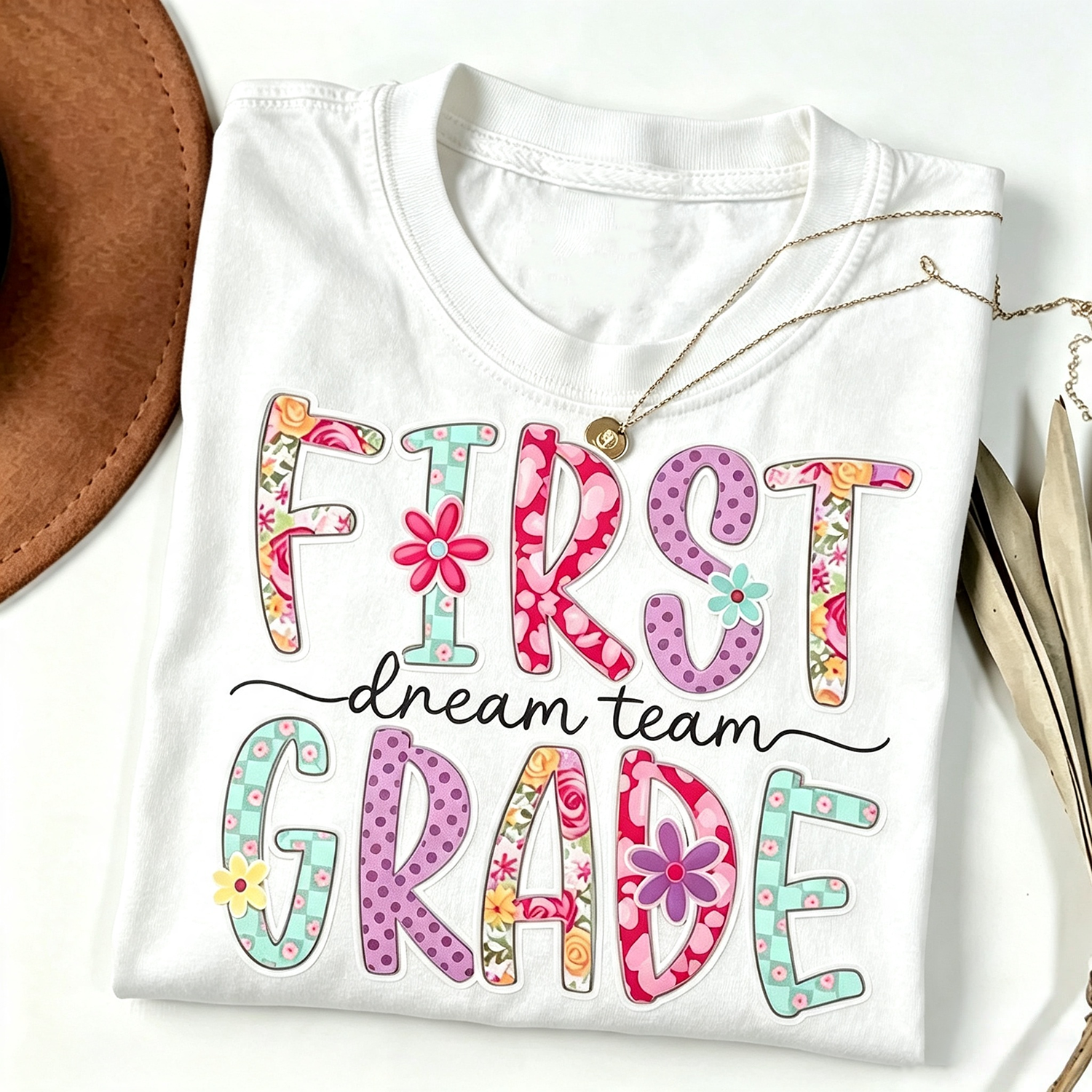 First Grade Dream Team Teacher Graphic T‑Shirt for Women, Floral Pattern Casual Short Sleeve Crewneck Tee, Elementary Educator Gift Top