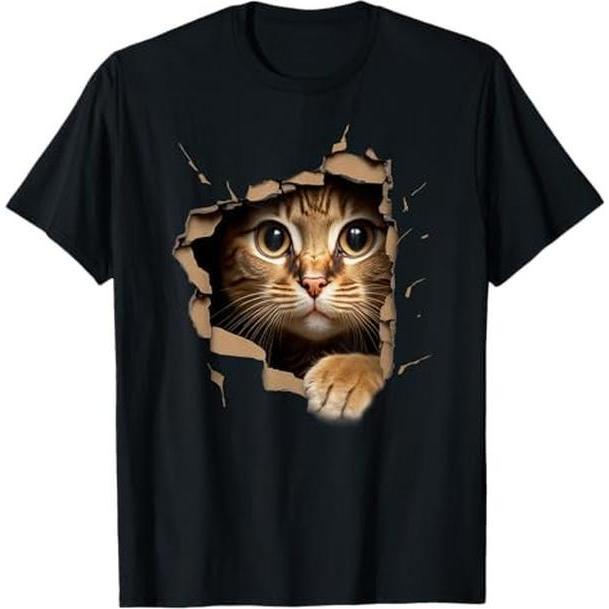 Cute kitten looks from torn fabric  T-Shirt