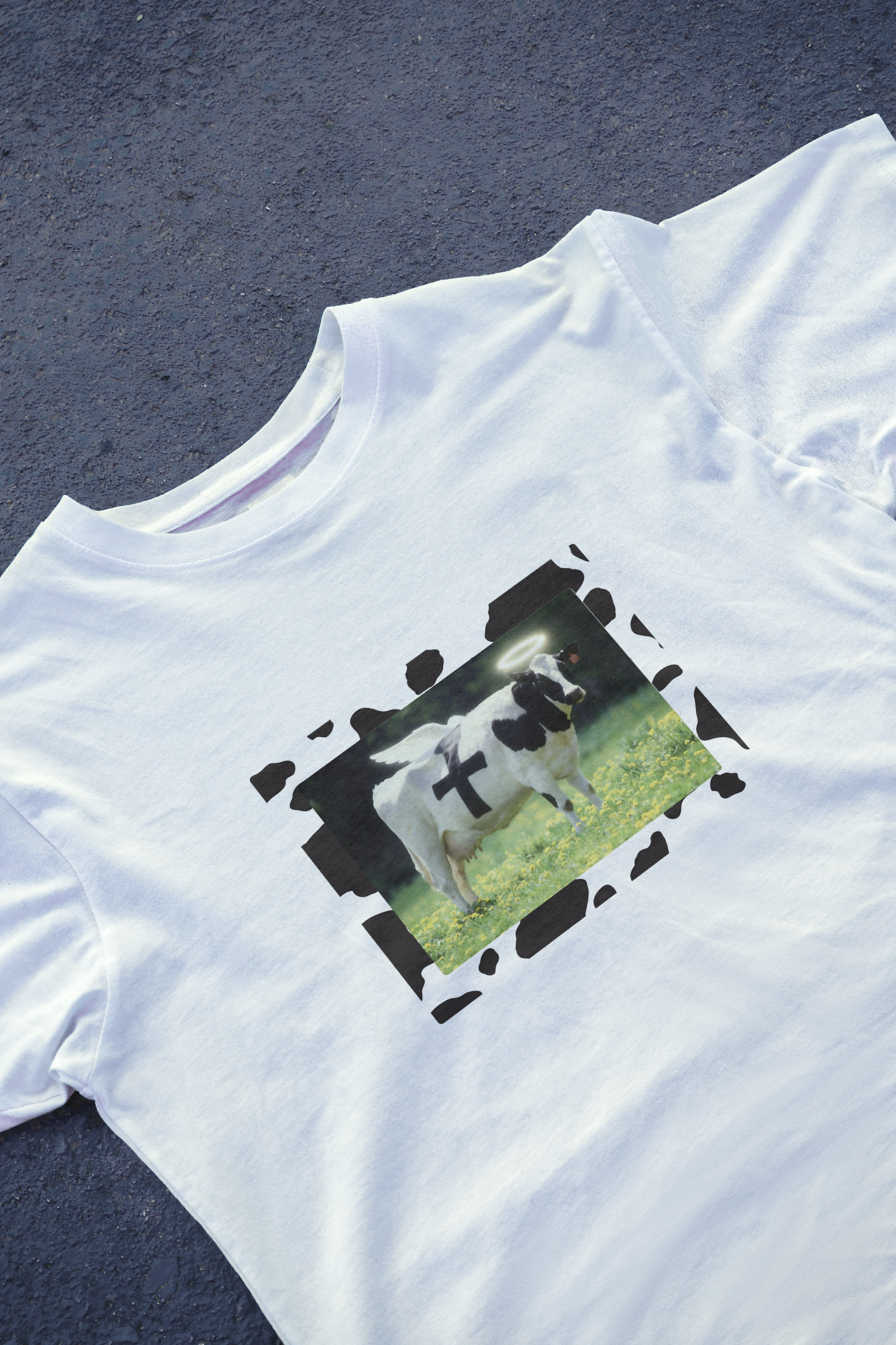 DIYANYONE Surreal Meme T-Shirt: Holy Cow Angel with Black Cross | Divine Bovine Religious Satire & Cow Print Aesthetic Tee