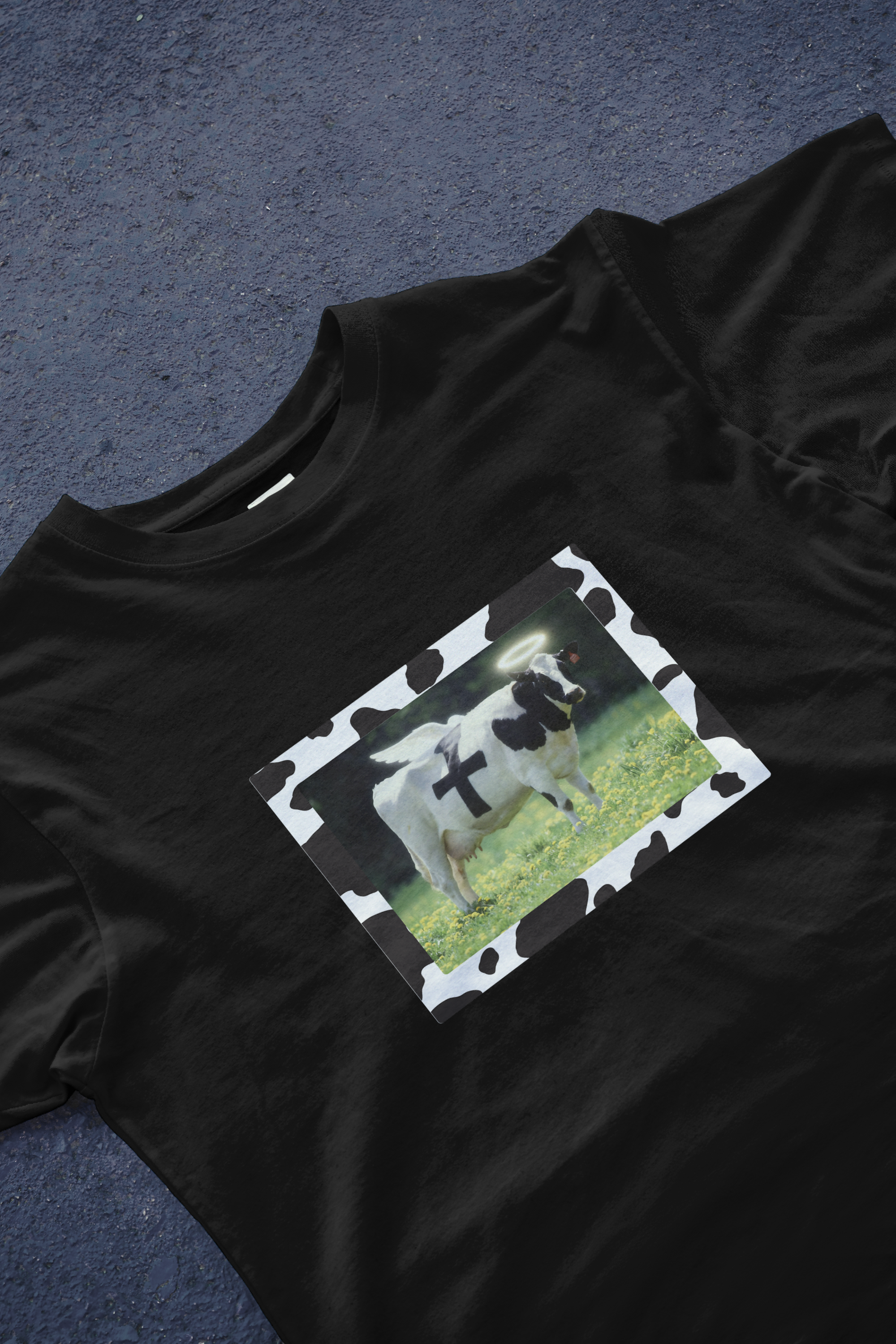DIYANYONE Surreal Meme T-Shirt: Holy Cow Angel with Black Cross | Divine Bovine Religious Satire & Cow Print Aesthetic Tee
