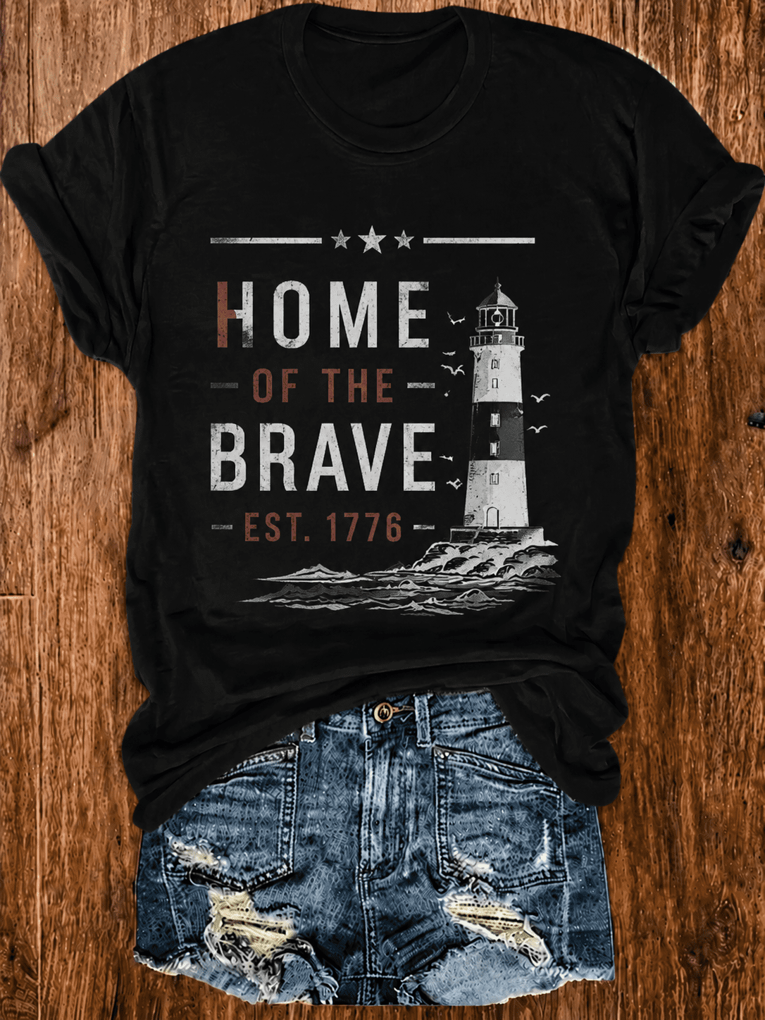 Patriotic Lighthouse Graphic T-Shirt – “Home of the Brave EST. 1776” Casual Tee