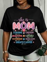 She Is Mom Inspirational Scripture Graphic T‑Shirt, Colorful Floral Faith Crewneck Short Sleeve Tee, Encouraging Gift for Mothers