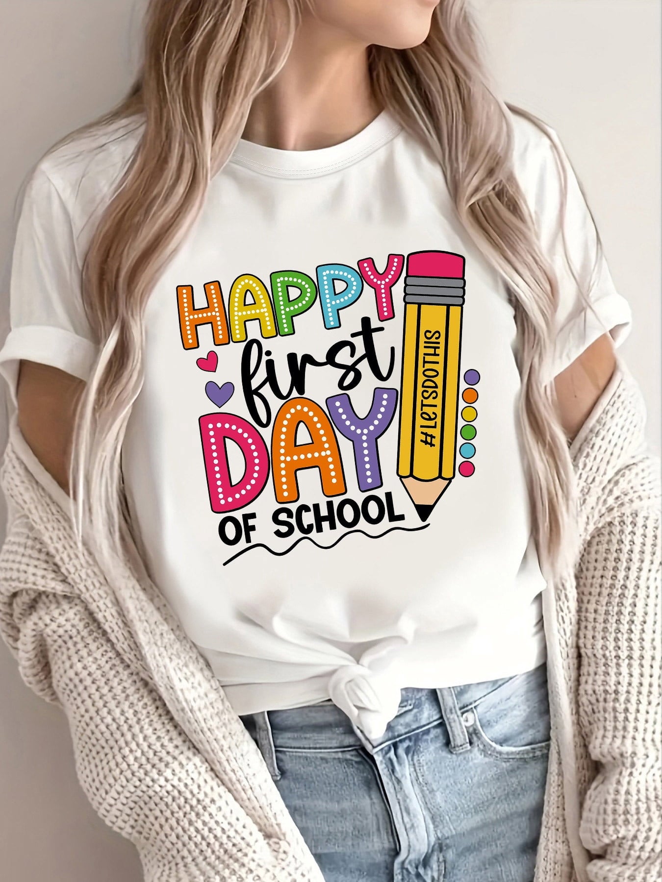 A Women'S Casual Round-Neck T-Shirt for The Back-To- Season, Featuring a Pencil And Colorful Letter Design. It Has Short Sleeves, Is Machine Washable, Suitable for All Seasons, And Is a Regular Fit