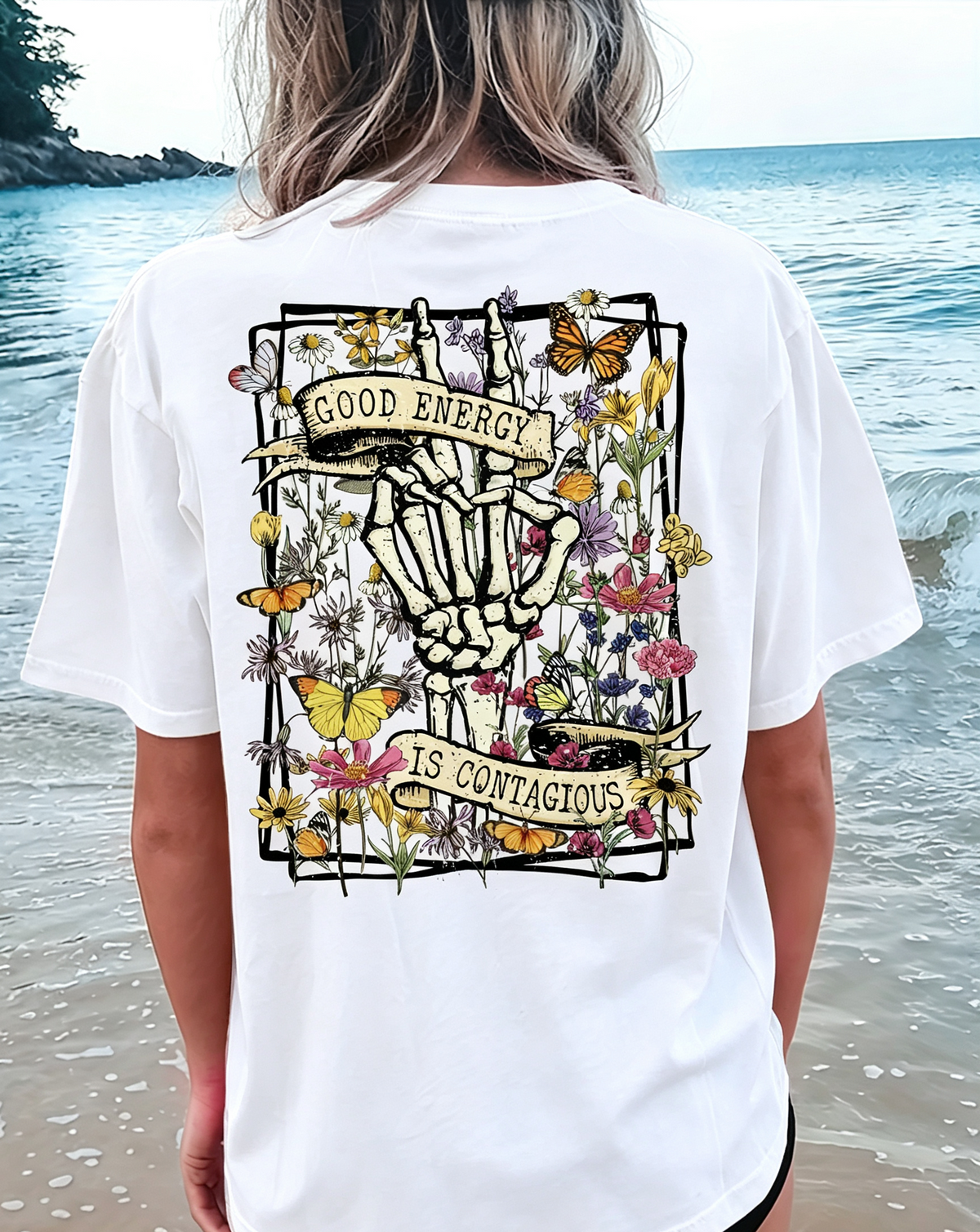 Women’s Floral Skeleton & Butterfly Graphic Print T-Shirt - "Good Energy Is Contagious" Short Sleeve Crew Neck Casual Top