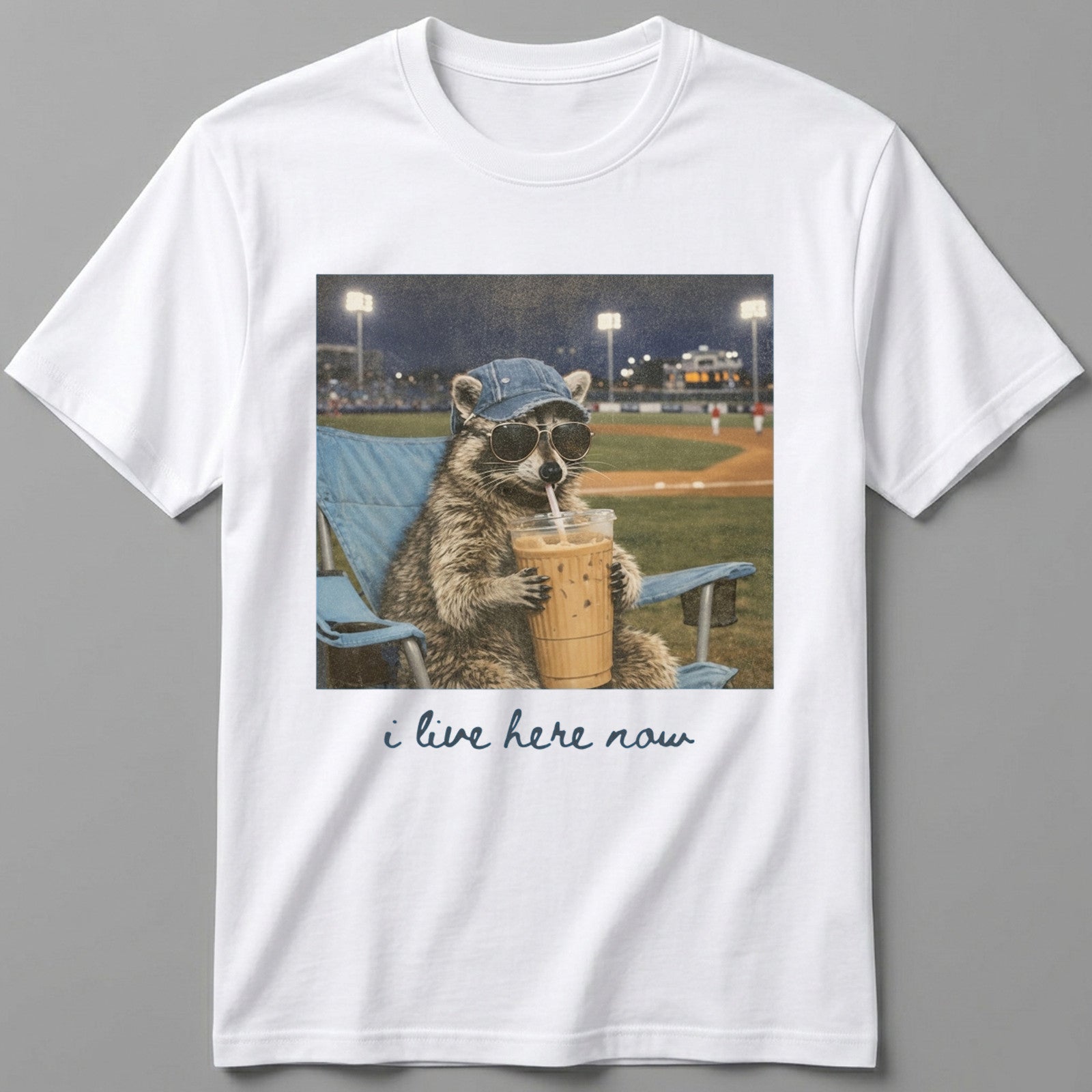 I Live Here Now Raccoon T-Shirt Baseball Fan Funny Graphic Tee White Cotton